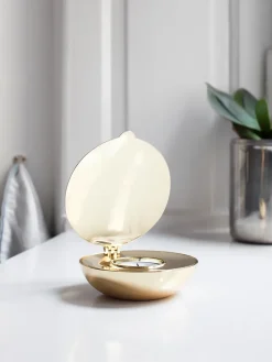 Portavelas Shell, latón